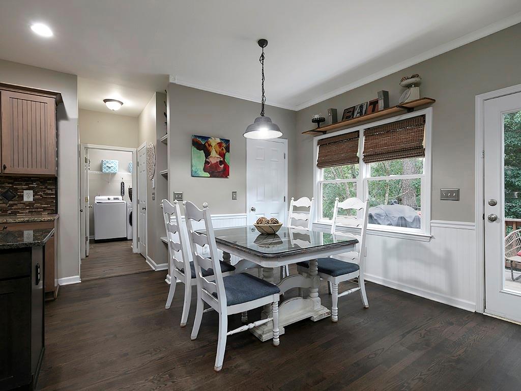 117 Constitution Pointe Dallas, GA 30132 - Photo 16 of 50 a view of a dining room with furniture window and wooden floor