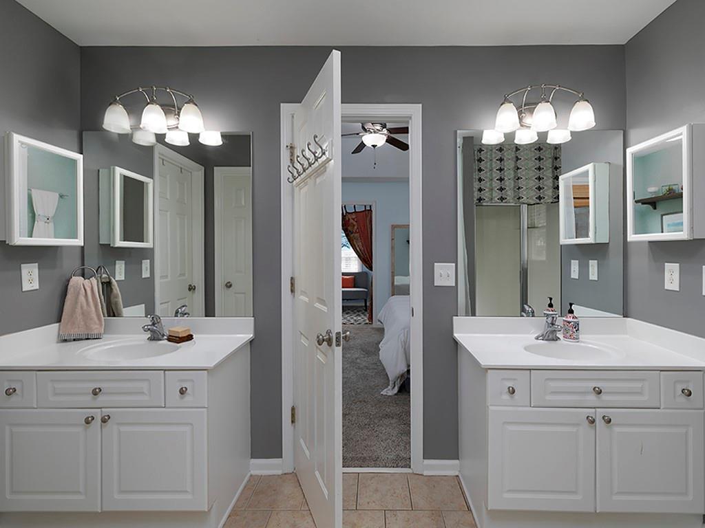 117 Constitution Pointe Dallas, GA 30132 - Photo 27 of 50 a bathroom with a sink double vanity and a mirror
