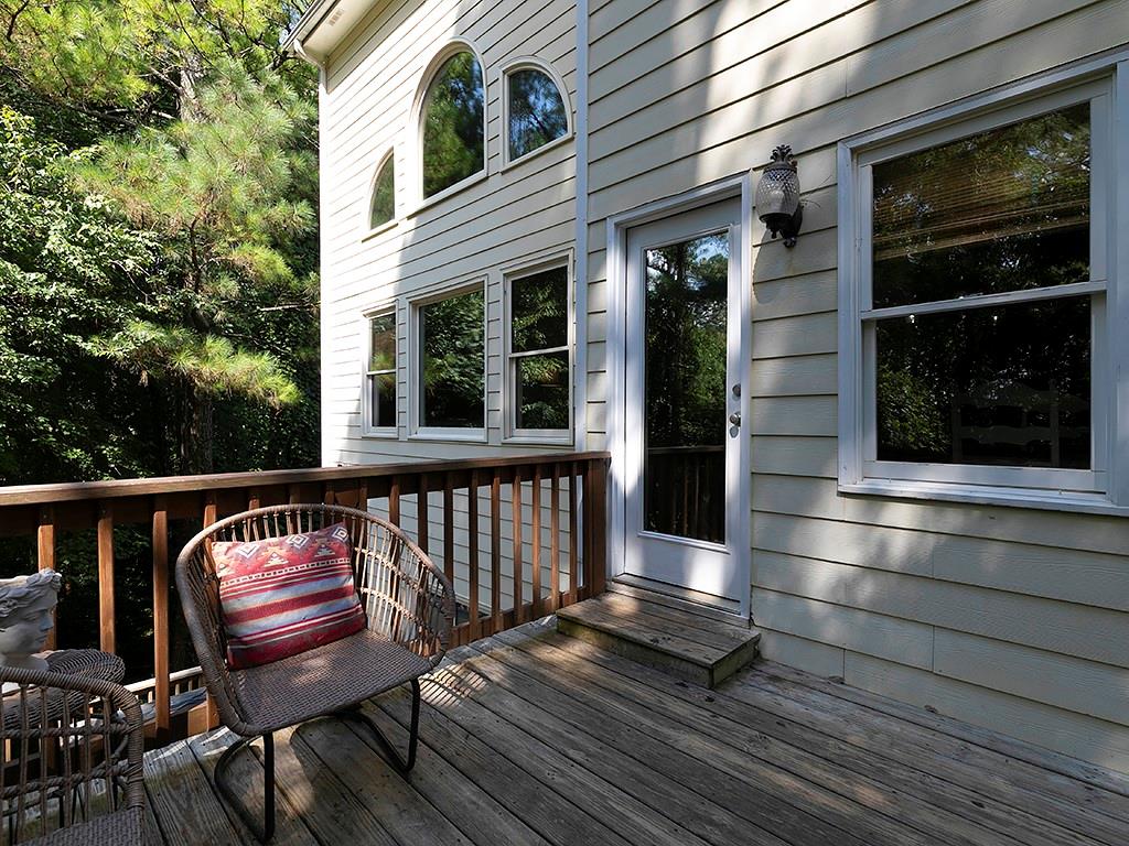 117 Constitution Pointe Dallas, GA 30132 - Photo 38 of 50 a view of balcony with wooden floor and outdoor seating