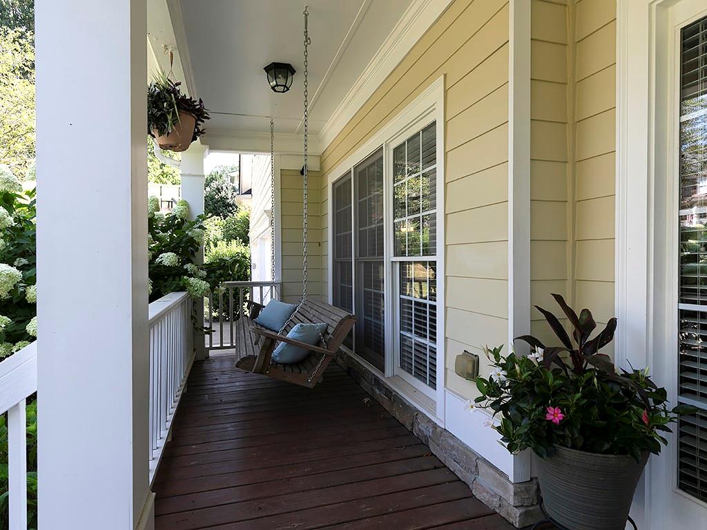 117 Constitution Pointe Dallas, GA 30132 - Photo 4 of 50 a porch with wooden floor