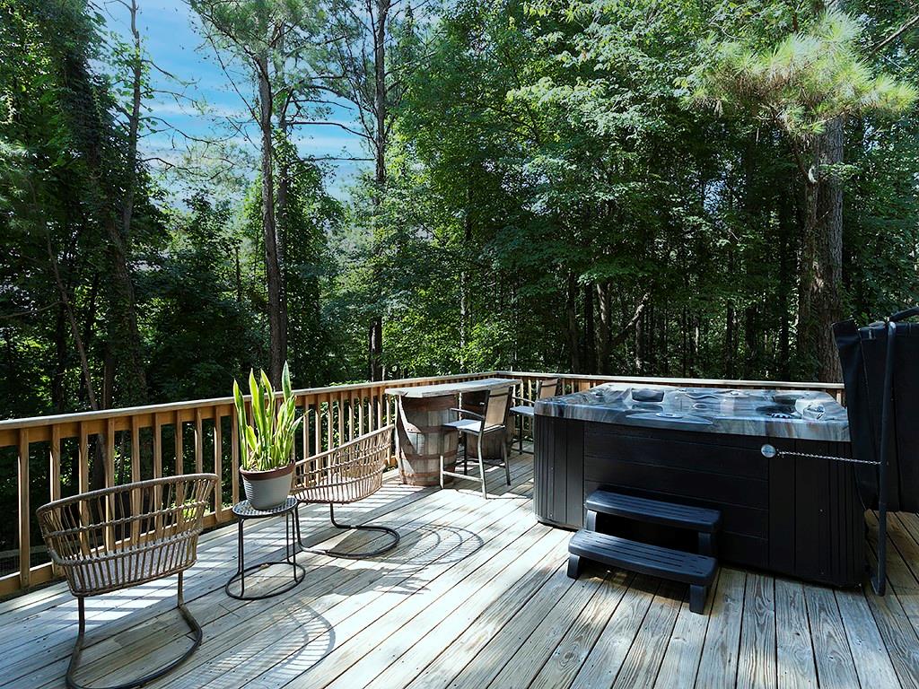 117 Constitution Pointe Dallas, GA 30132 - Photo 41 of 50 a view of balcony with wooden floor and outdoor seating
