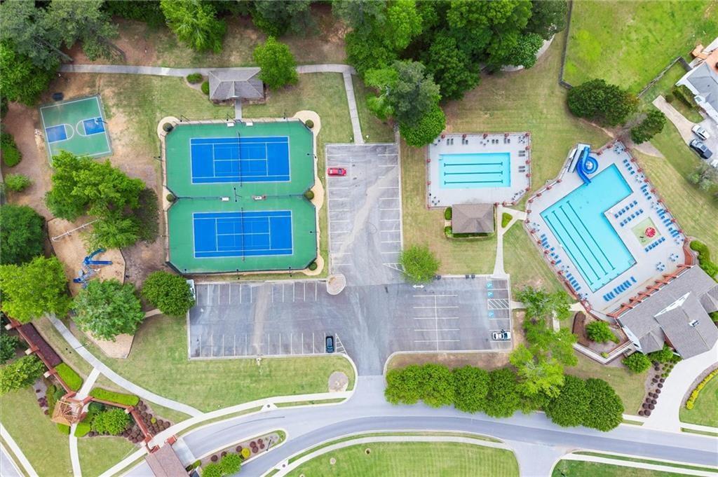 117 Constitution Pointe Dallas, GA 30132 - Photo 42 of 50 an aerial view of a house with swimming pool and outdoor seating