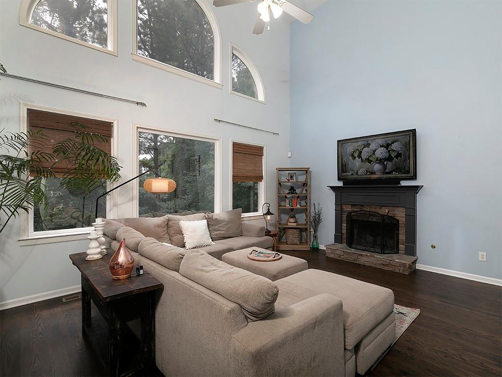 117 Constitution Pointe Dallas, GA 30132 - Photo 9 of 50 a living room with furniture and a fireplace