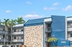 a vase of flowers sitting on a table