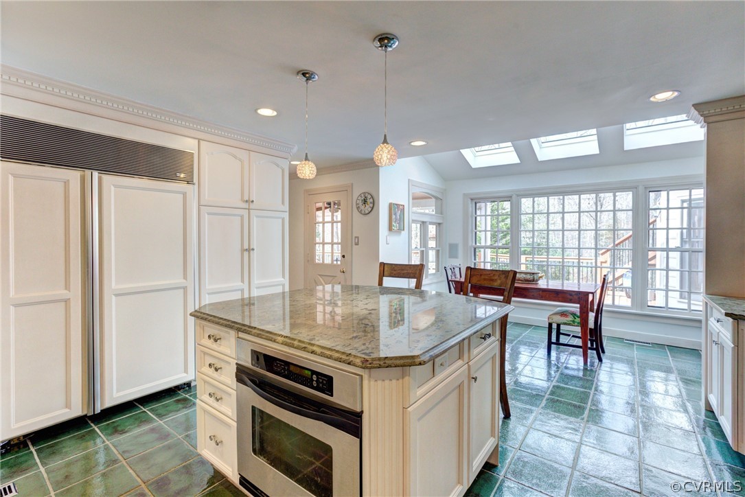 9810 Kingsbridge Road Henrico, VA 23238 - Photo 16 of 32 a kitchen with stainless steel appliances granite countertop a stove and a sink