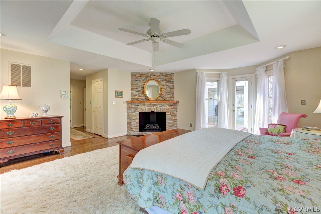 9810 Kingsbridge Road Henrico, VA 23238 - Photo 20 of 32 a bed room with a bed and a fireplace