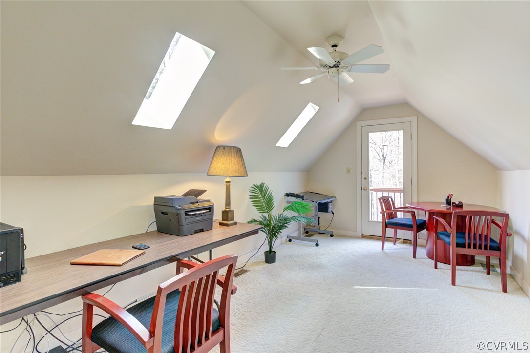 9810 Kingsbridge Road Henrico, VA 23238 - Photo 24 of 32 a living room with furniture a fireplace and a chandelier