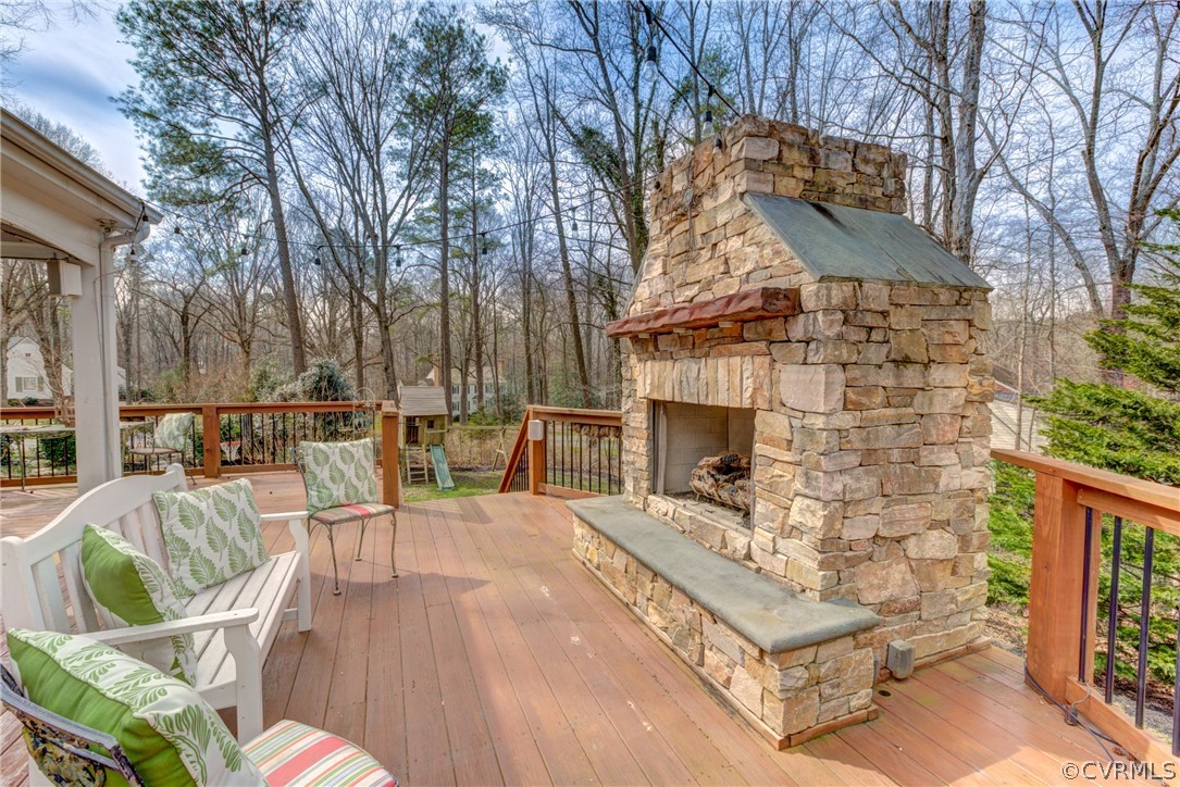 9810 Kingsbridge Road Henrico, VA 23238 - Photo 30 of 32 a view of a patio with couches table and chairs with wooden floor and fence
