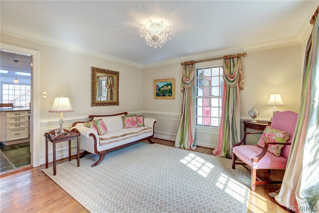 9810 Kingsbridge Road Henrico, VA 23238 - Photo 7 of 32 a living room with furniture and a chandelier
