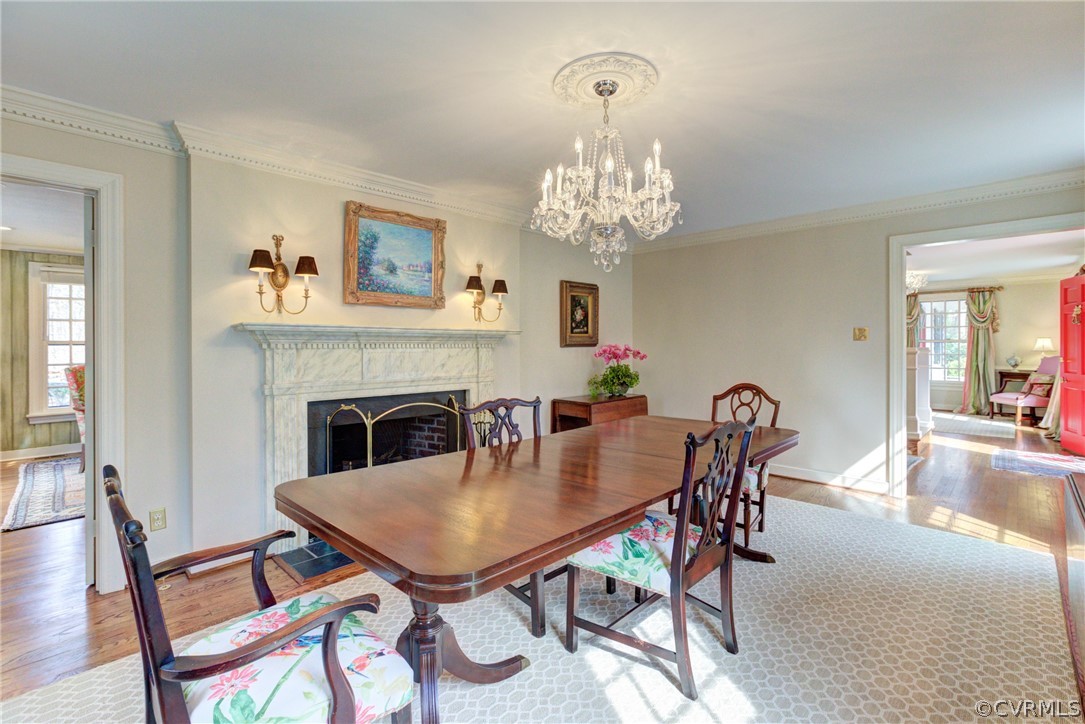 9810 Kingsbridge Road Henrico, VA 23238 - Photo 10 of 32 a view of a dining room with furniture and chandelier