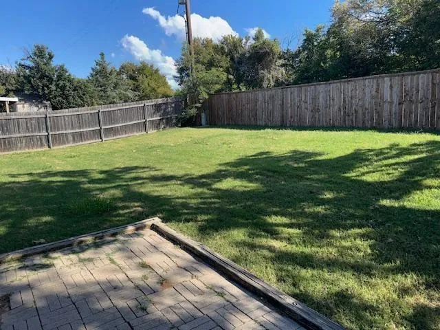 a view of a backyard with a garden