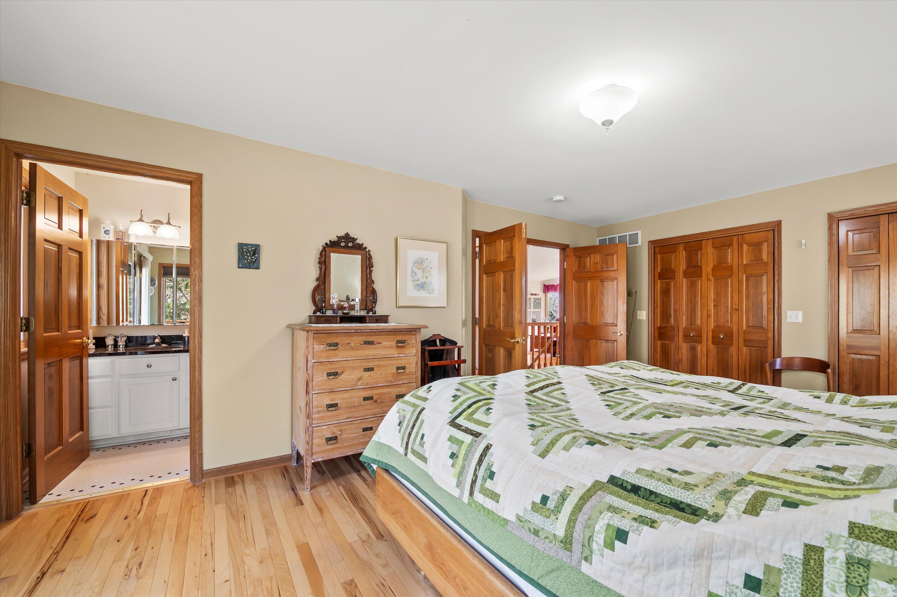 W303N2665 Maple Avenue Delafield, WI 53072 - Photo 27 of 50 Primary Bedroom