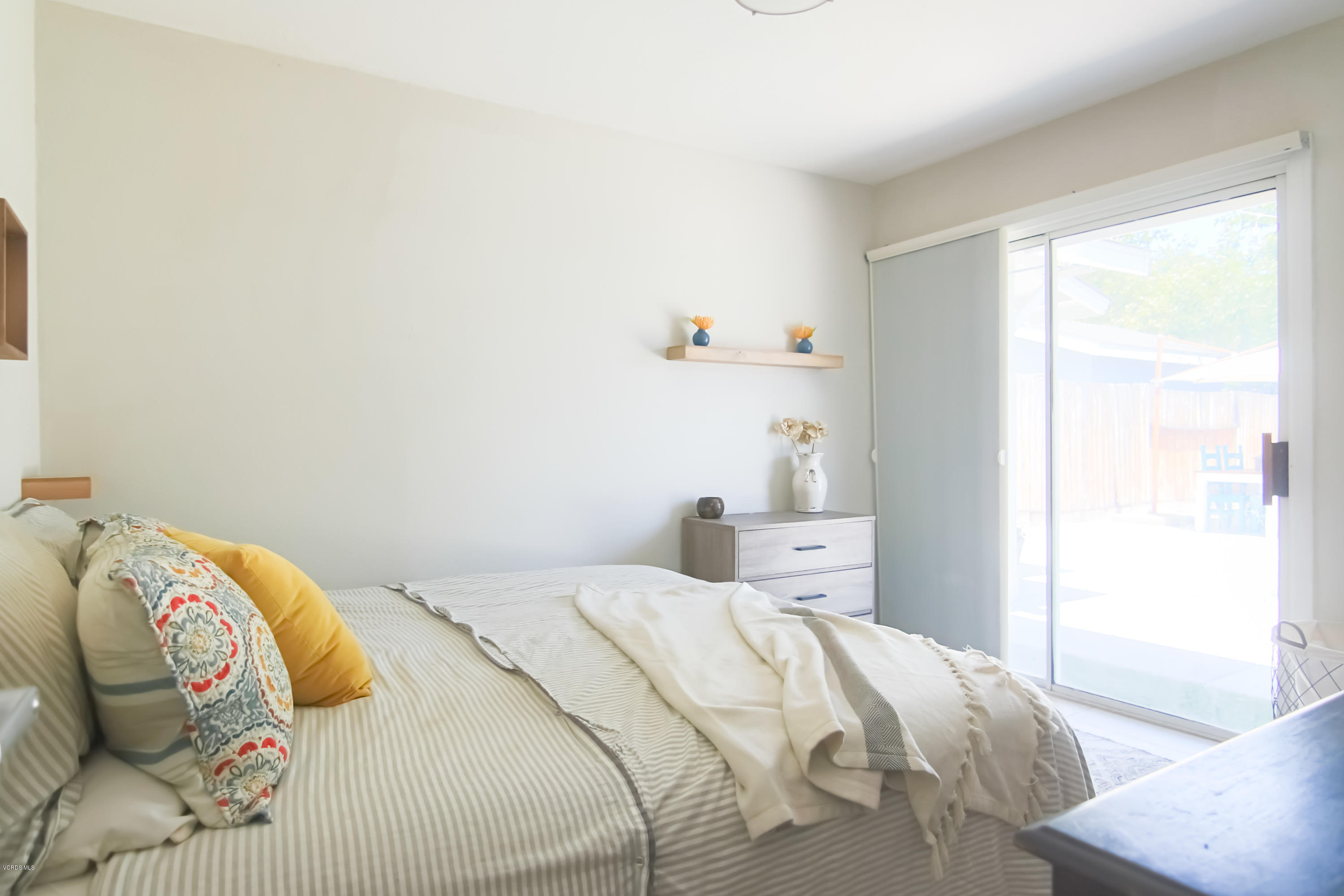 108 Drown Avenue Ojai, CA 93023 - Photo 12 of 37 a bedroom with a bed and a window