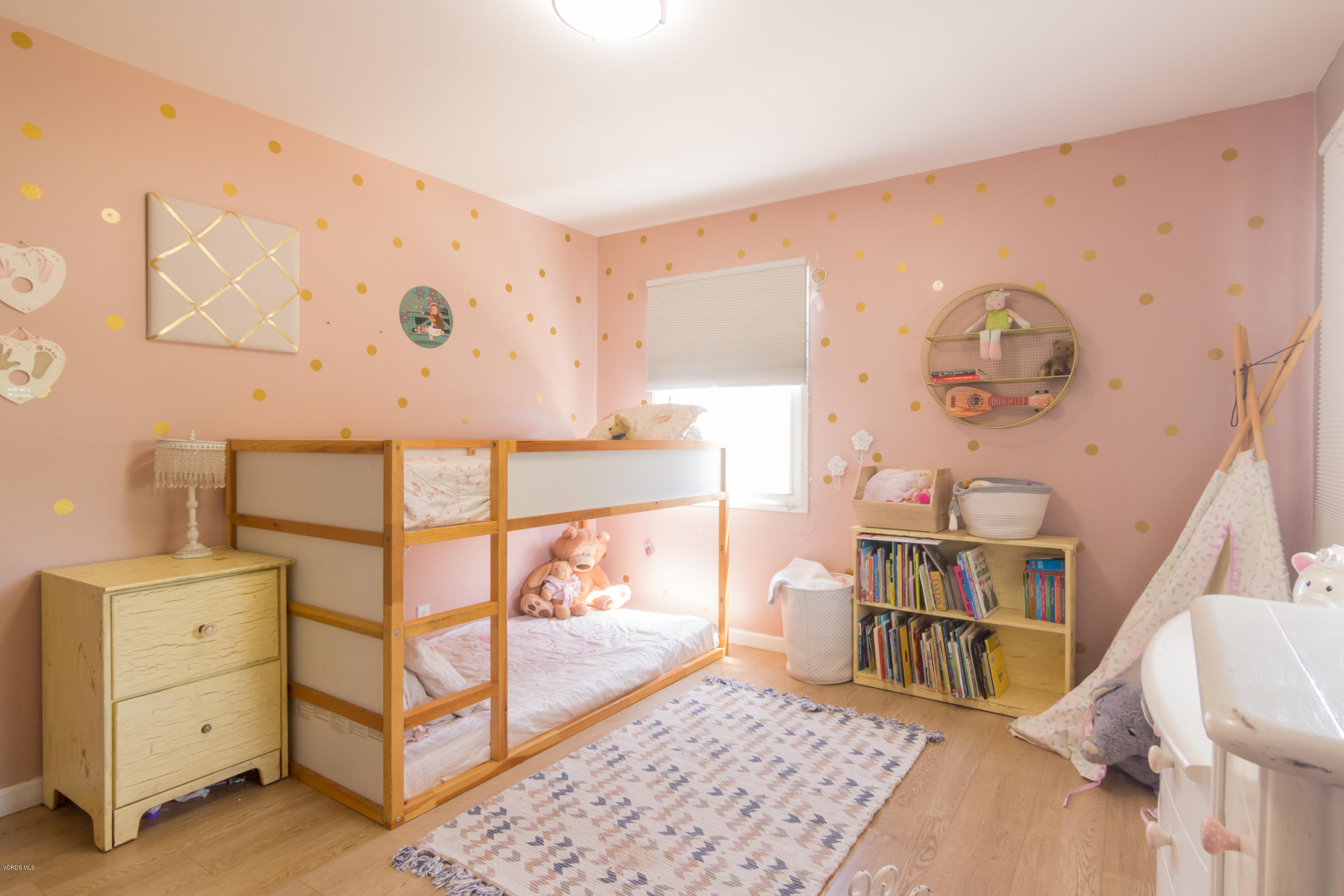 108 Drown Avenue Ojai, CA 93023 - Photo 14 of 37 a bed room with a bed and a baby crib