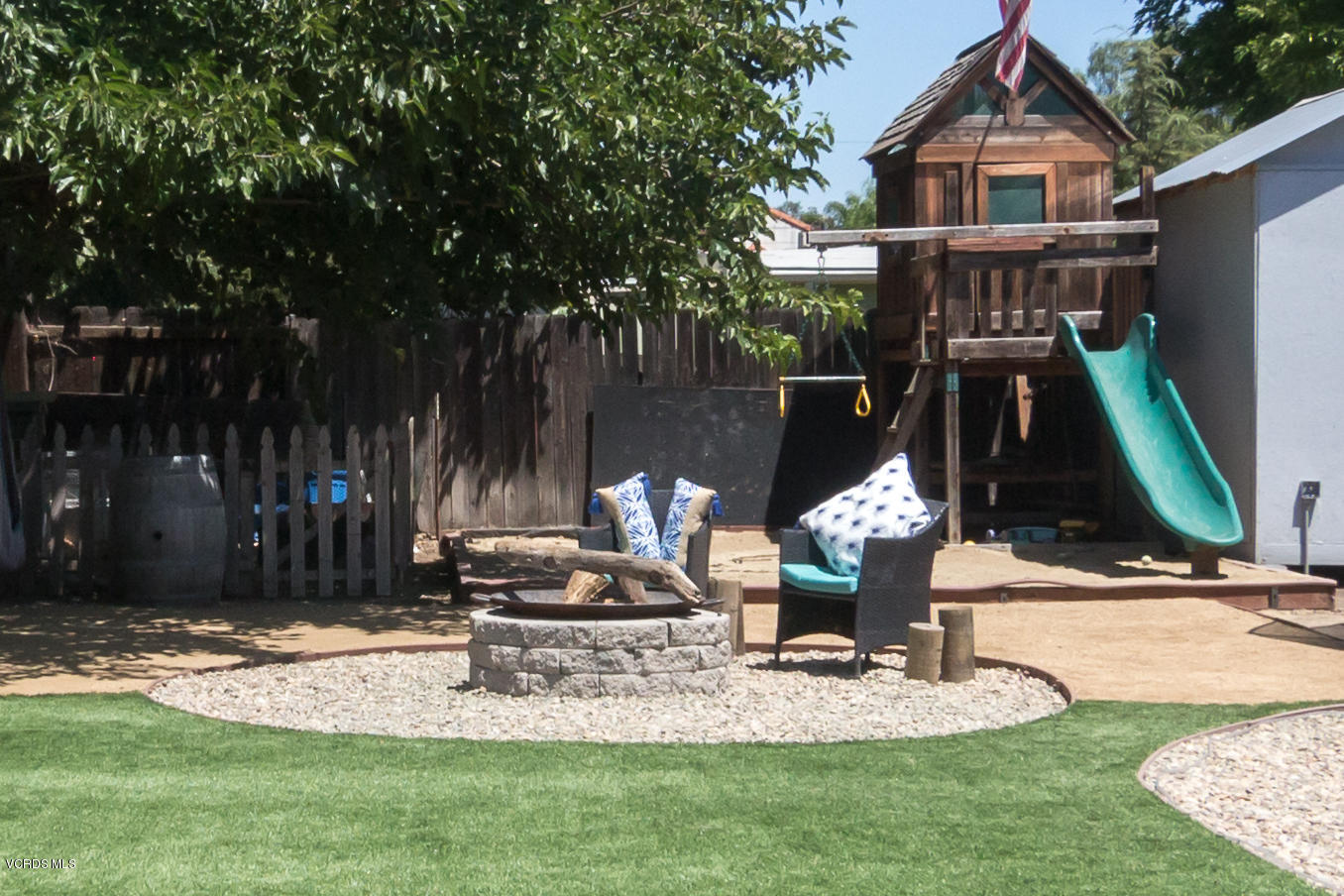 108 Drown Avenue Ojai, CA 93023 - Photo 19 of 37 a front view of a house with garden and sitting area