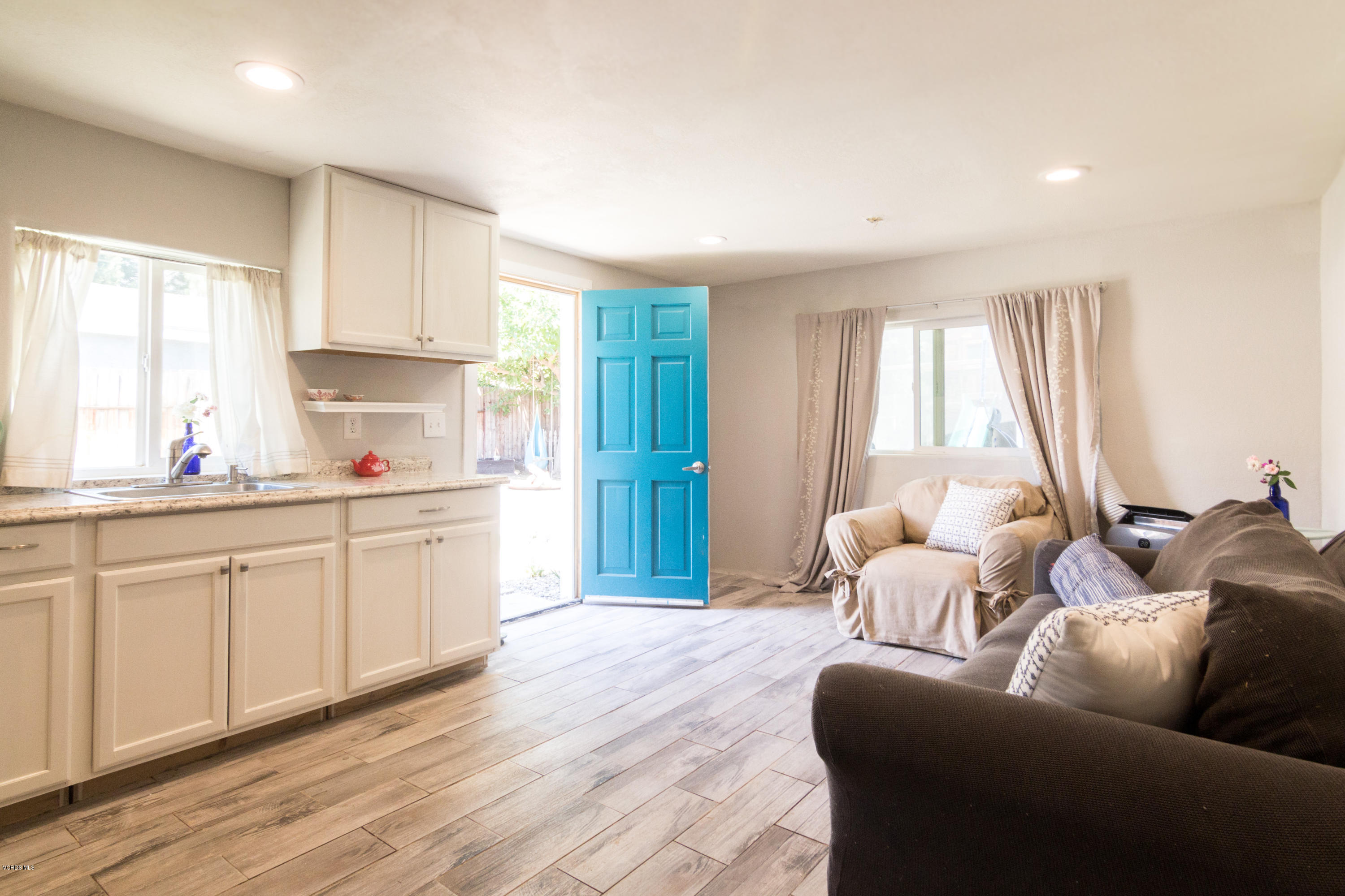 108 Drown Avenue Ojai, CA 93023 - Photo 23 of 37 a living room with furniture and a large window