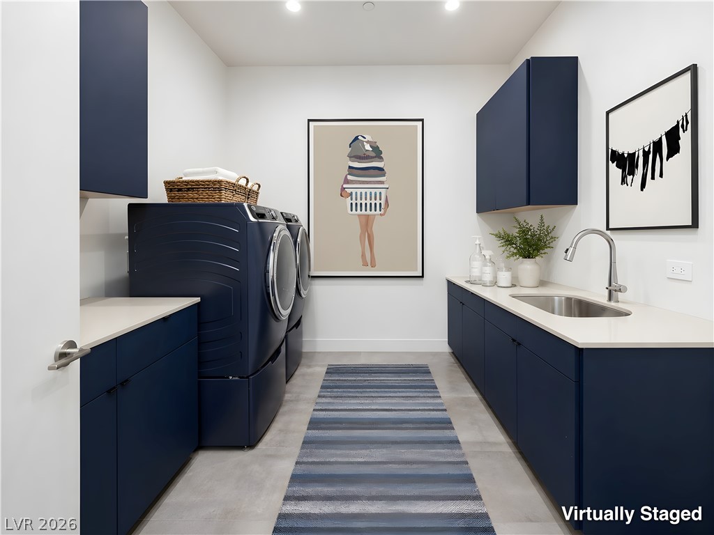 25 Falling Ridge Lane Henderson, NV 89011 - Photo 21 of 48 Streamlined laundry area with dual machines, sink, and ample storage for efficient chores.