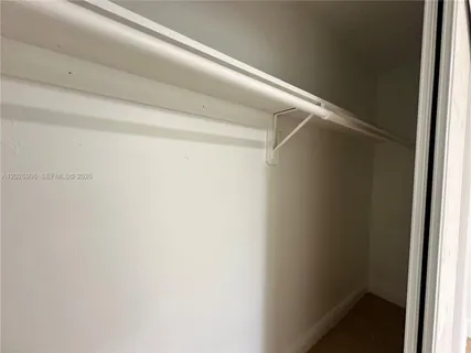 an empty room with an entryway