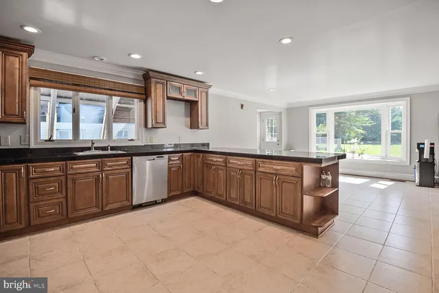 a kitchen with a sink counter top space and appliances