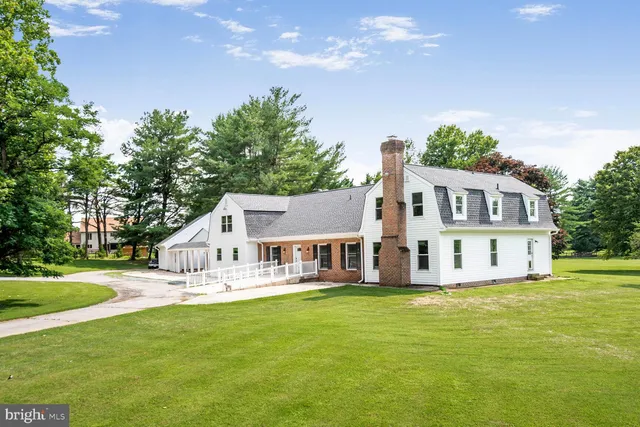 a house with garden in front of it