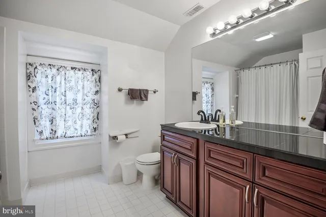 a view of a livingroom with furniture and wooden floor