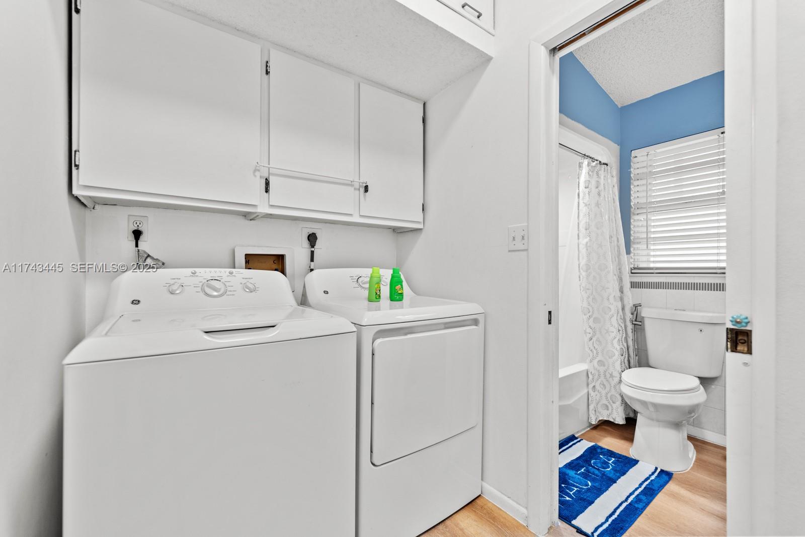 3635 Tradewinds Street Big Pine Key, FL 33043 - Photo 28 of 41 a utility room with dryer and washer