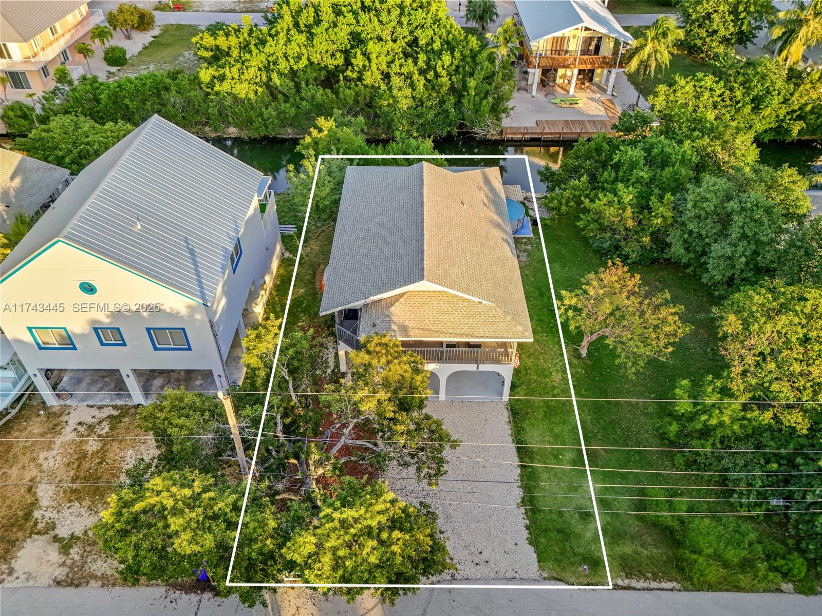 3635 Tradewinds Street Big Pine Key, FL 33043 - Photo 3 of 41 an aerial view of a house