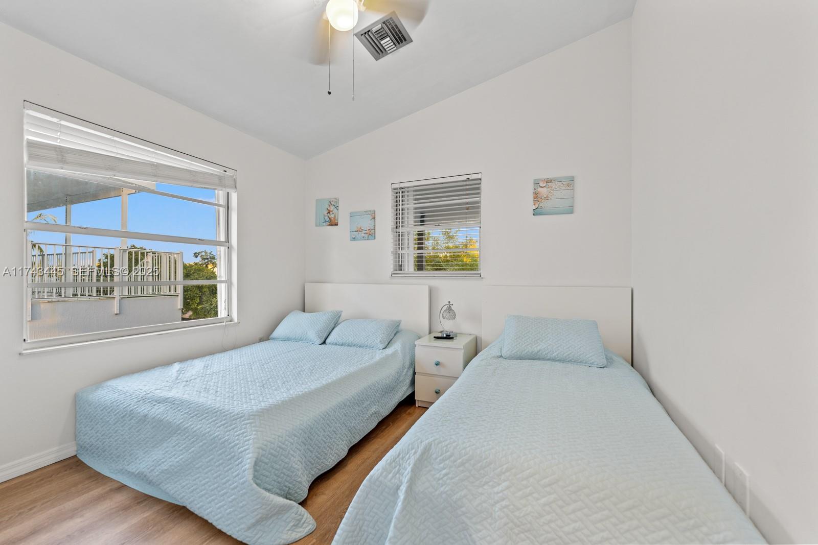 3635 Tradewinds Street Big Pine Key, FL 33043 - Photo 31 of 41 a bedroom with a bed and a window