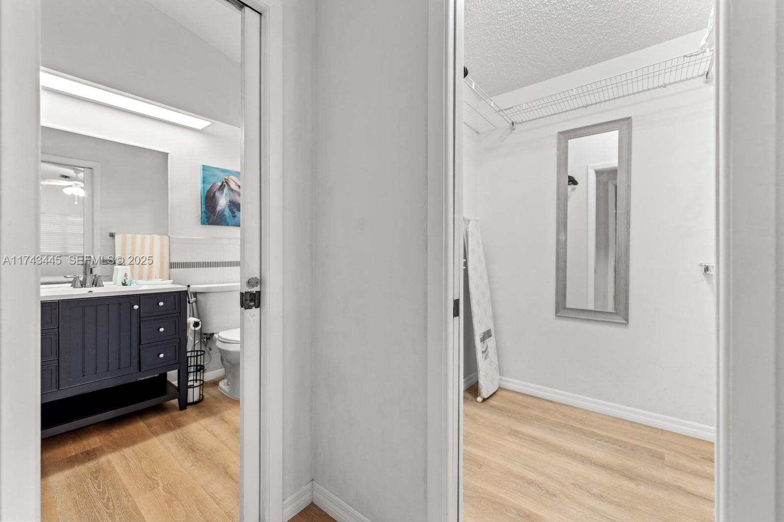 3635 Tradewinds Street Big Pine Key, FL 33043 - Photo 32 of 41 a view of a hallway and closet with a mirror