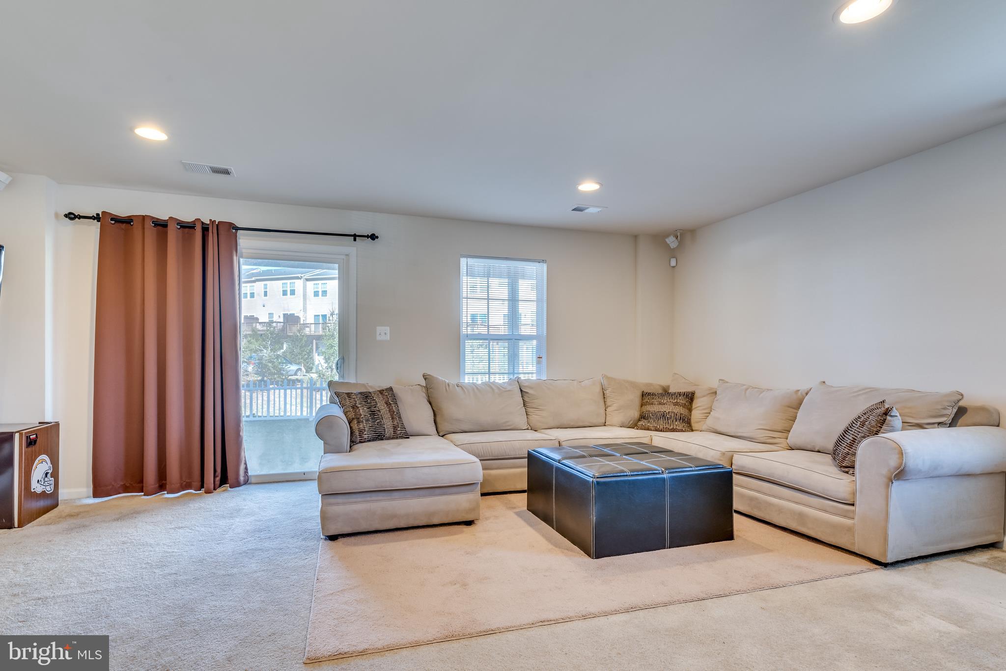 45 Gauley Riv Path Falling Waters, WV 25419 - Photo 11 of 47 Large family room with direct access to yard