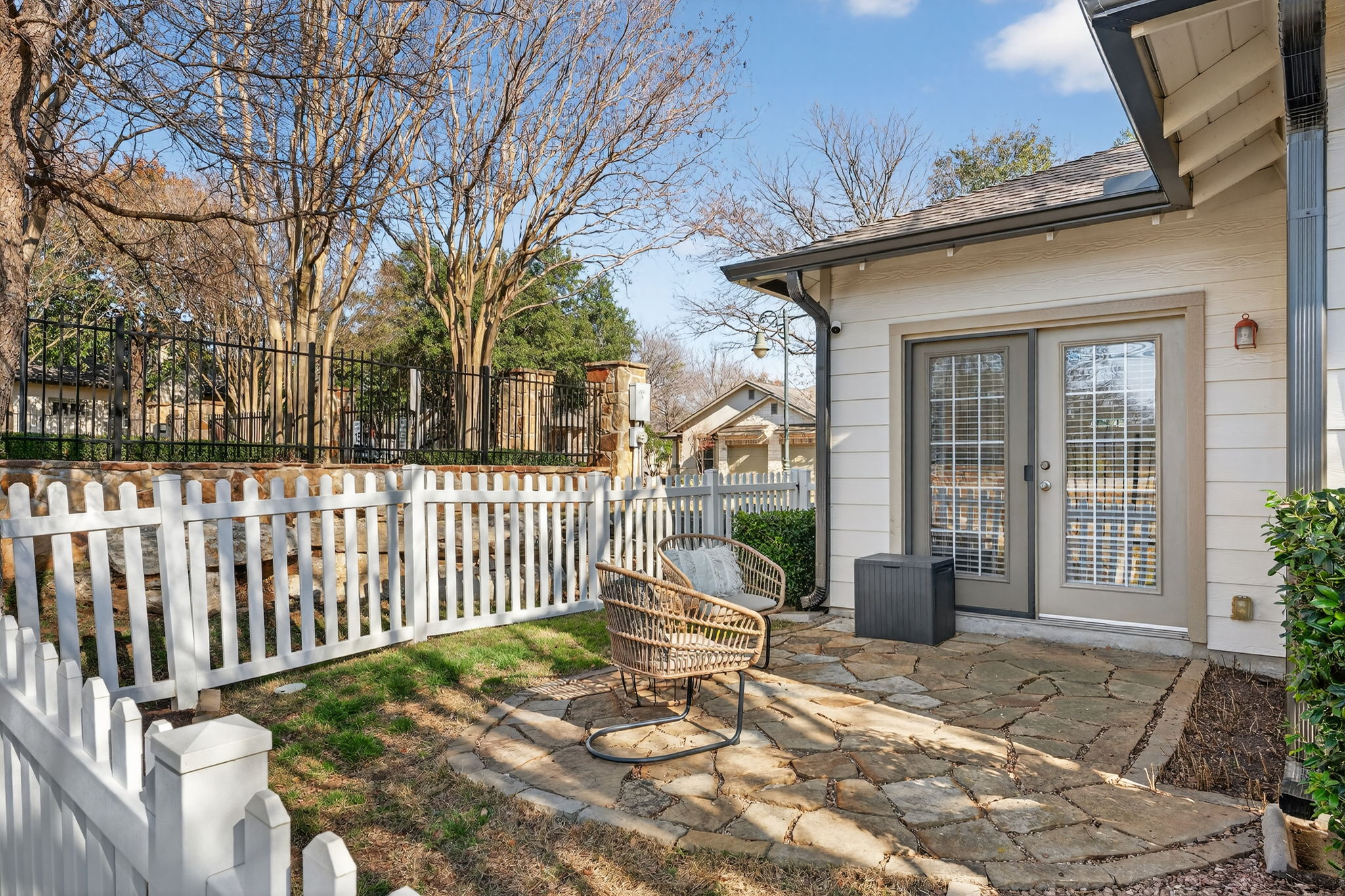 6801 Beckett Road, Unit 114R Austin, TX 78749 - Photo 17 of 21 a view of a house with a small yard and floor to ceiling window