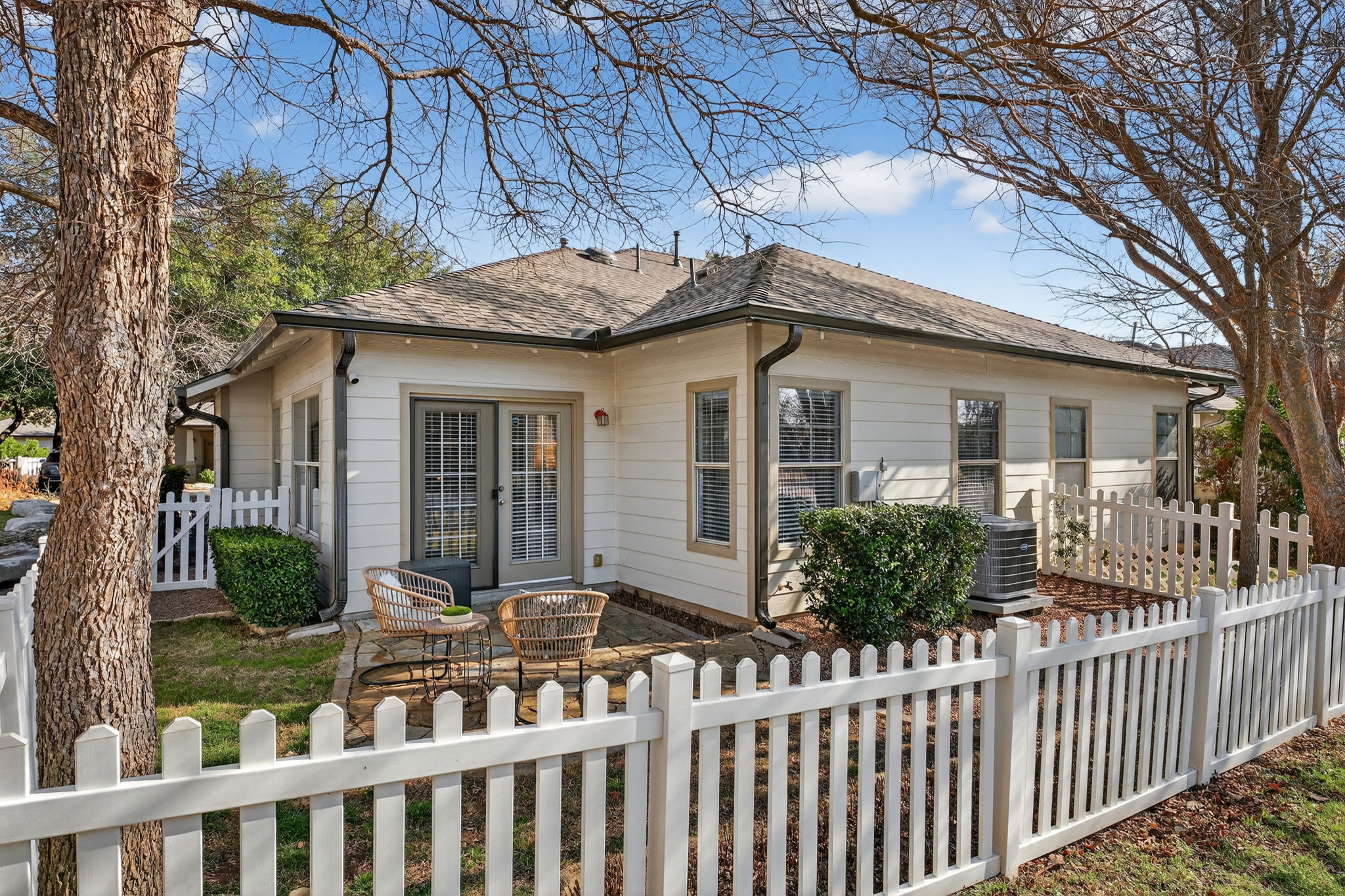 6801 Beckett Road, Unit 114R Austin, TX 78749 - Photo 18 of 21 a view of a house with wooden fence next to a yard