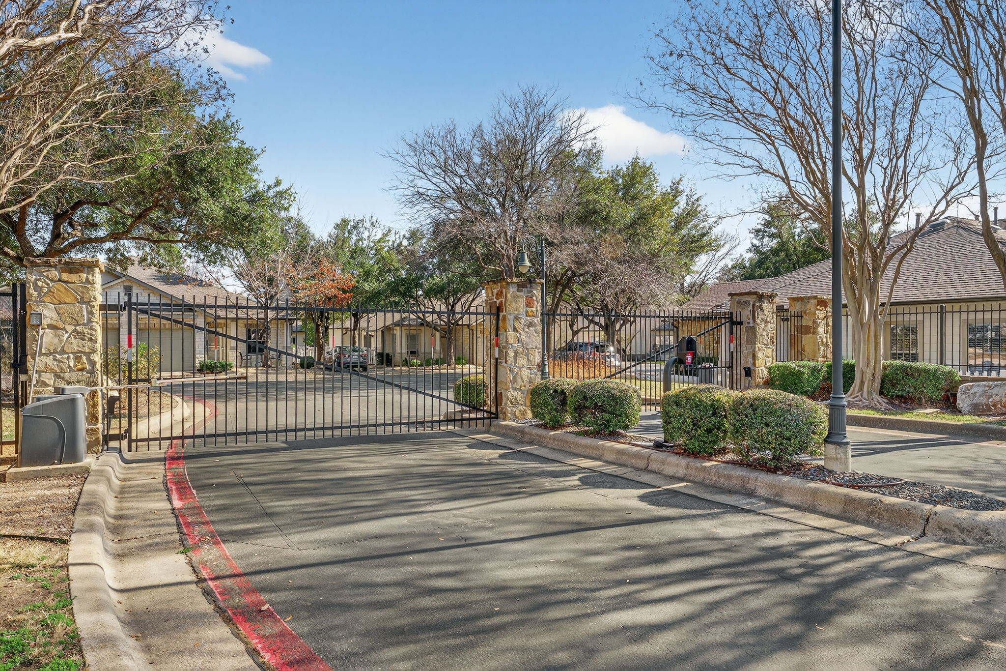 6801 Beckett Road, Unit 114R Austin, TX 78749 - Photo 19 of 21 a front view of a house with a garden
