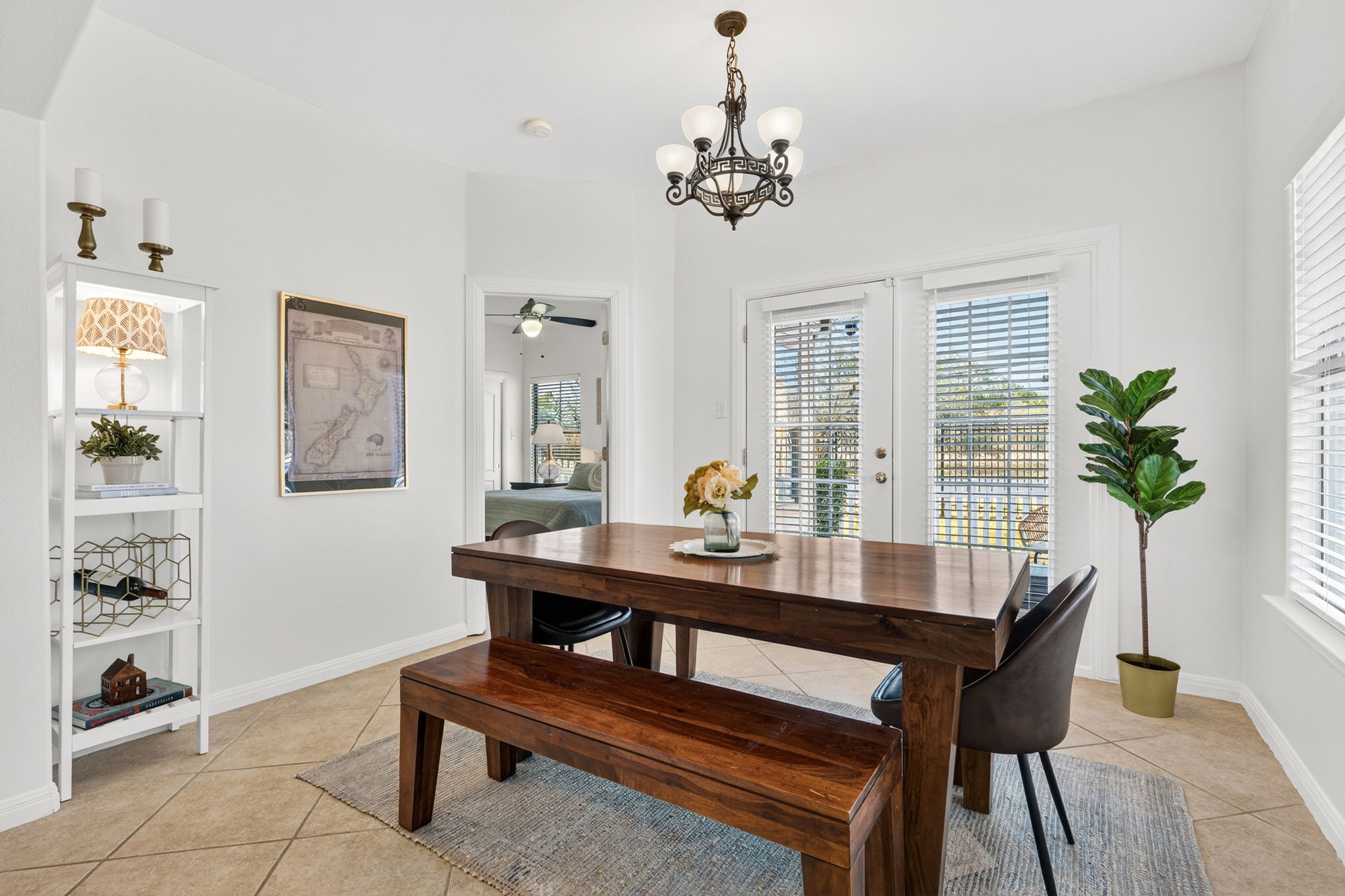 6801 Beckett Road, Unit 114R Austin, TX 78749 - Photo 9 of 21 a view of a dining room with furniture and wooden floor