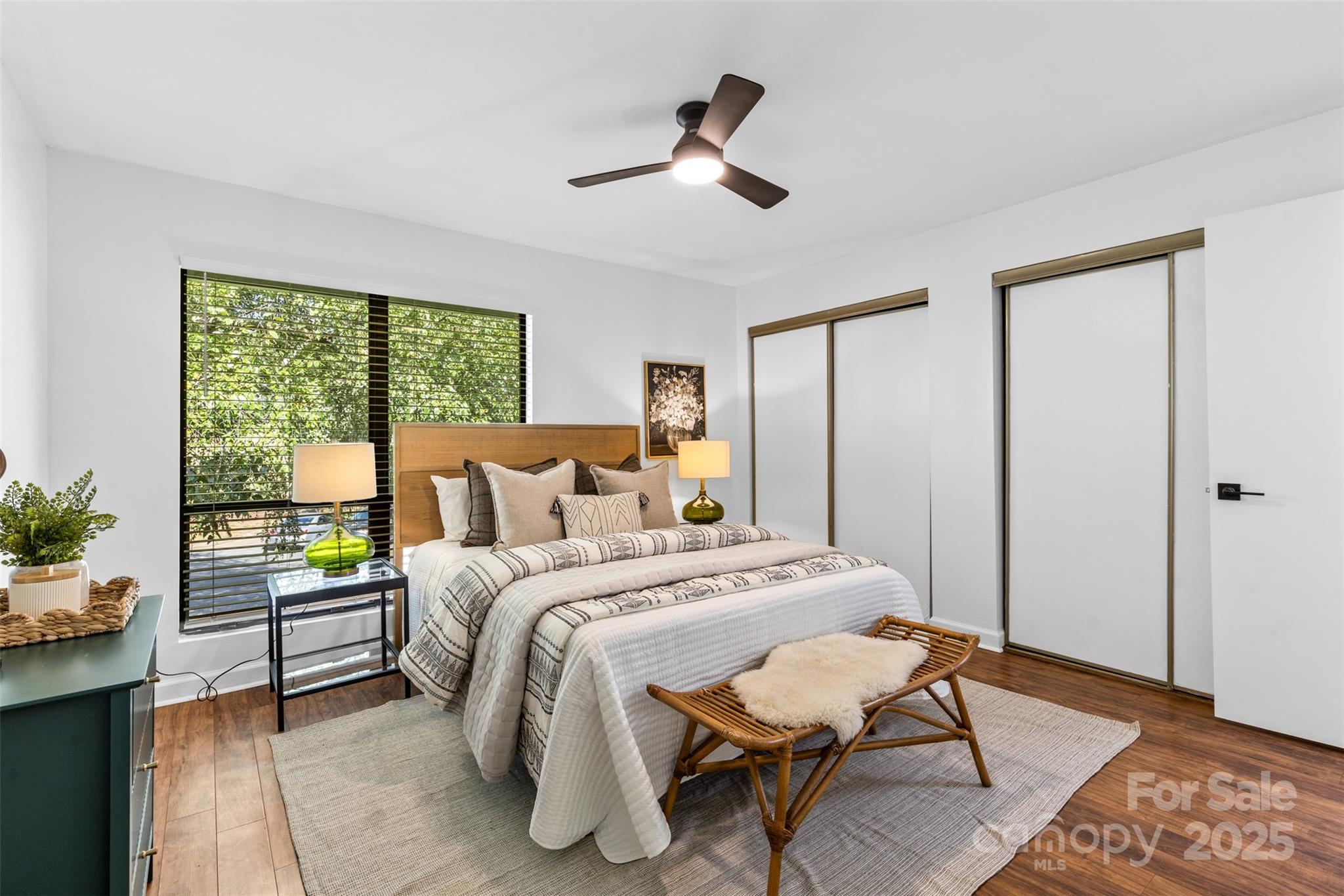 5016 Sardis Road, Unit G Charlotte, NC 28270 - Photo 16 of 24 a bedroom with a bed and a table in it