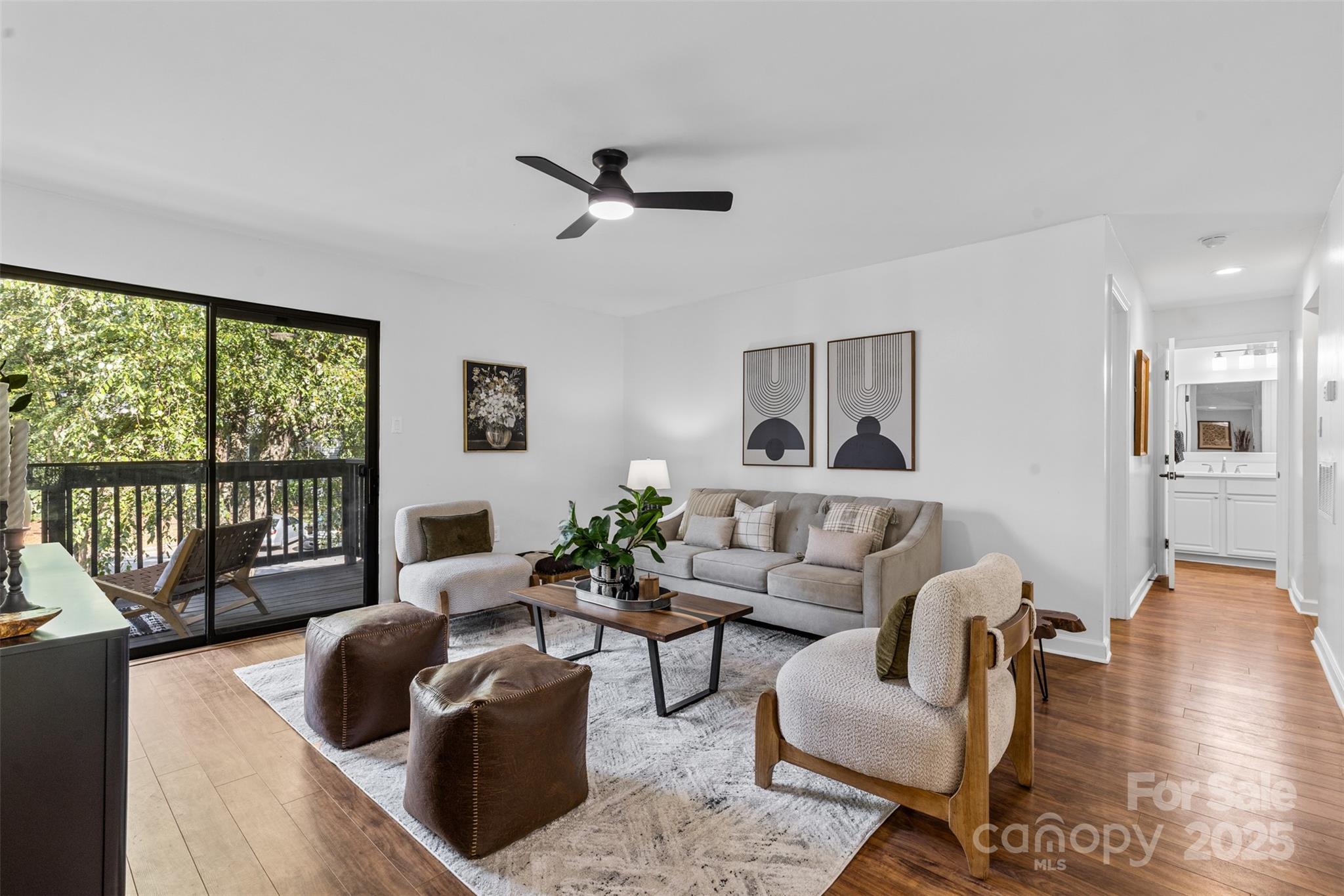 5016 Sardis Road, Unit G Charlotte, NC 28270 - Photo 2 of 24 a living room with furniture and a large window
