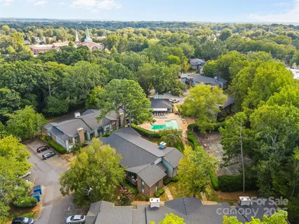 an aerial view of a house with a lake view