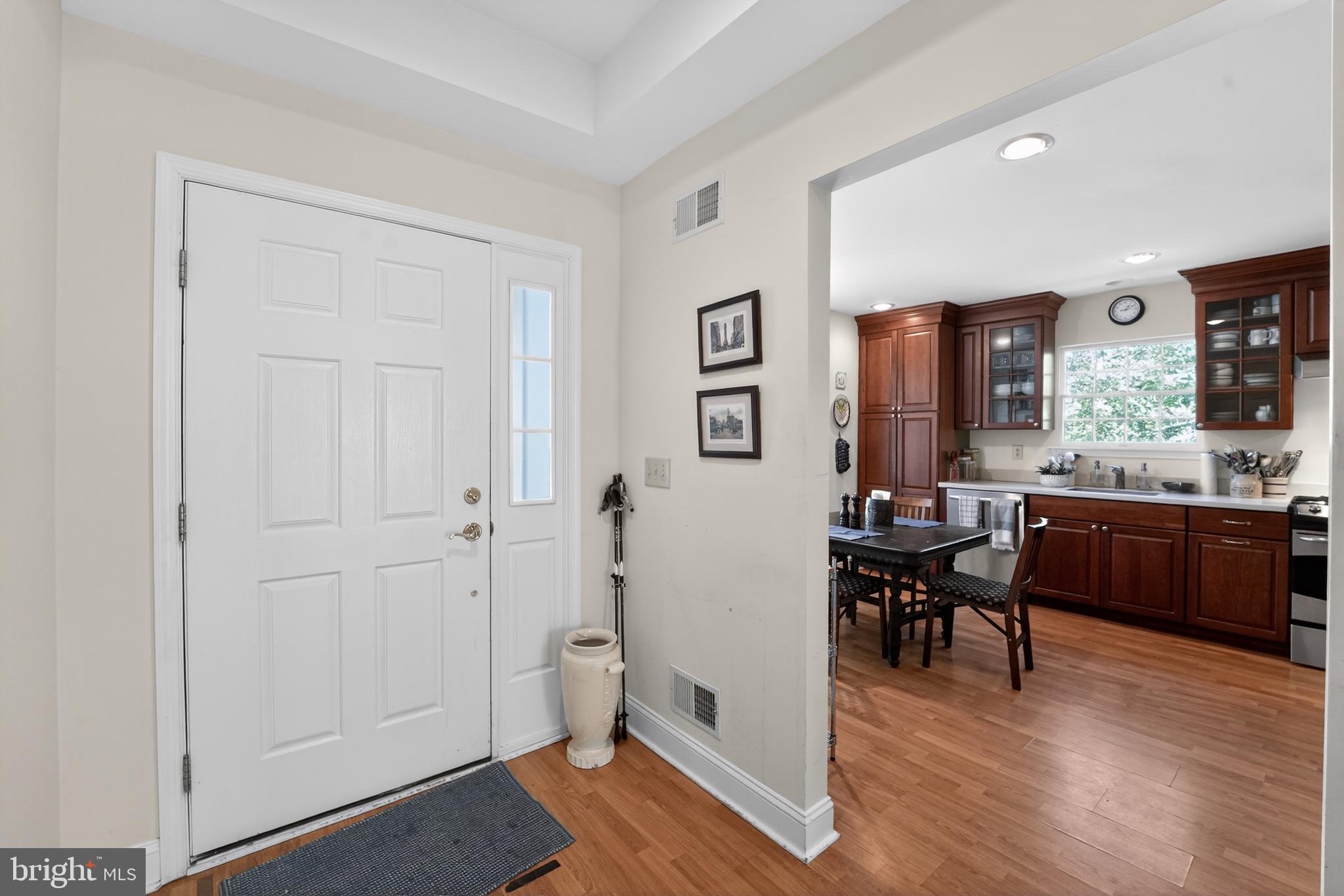 6 Hedge Row Road Princeton, NJ 08540 - Photo 3 of 32 a view of a dining room with furniture window and wooden floor