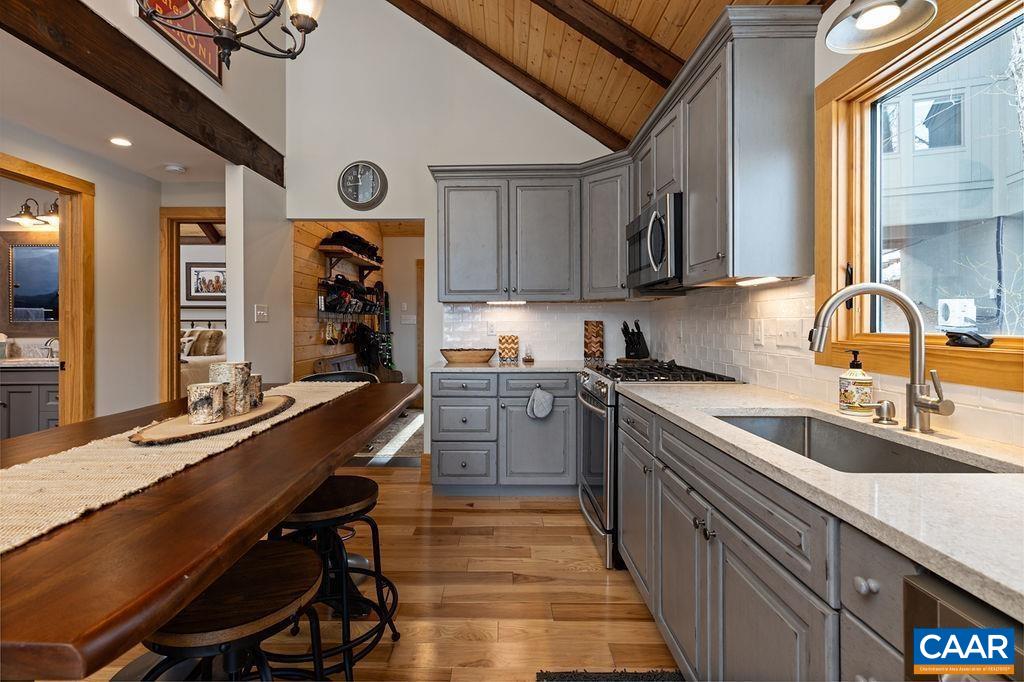 134 Squirrel Tree Lane Roseland, VA 22967 - Photo 14 of 40 a kitchen with a sink appliances and cabinets
