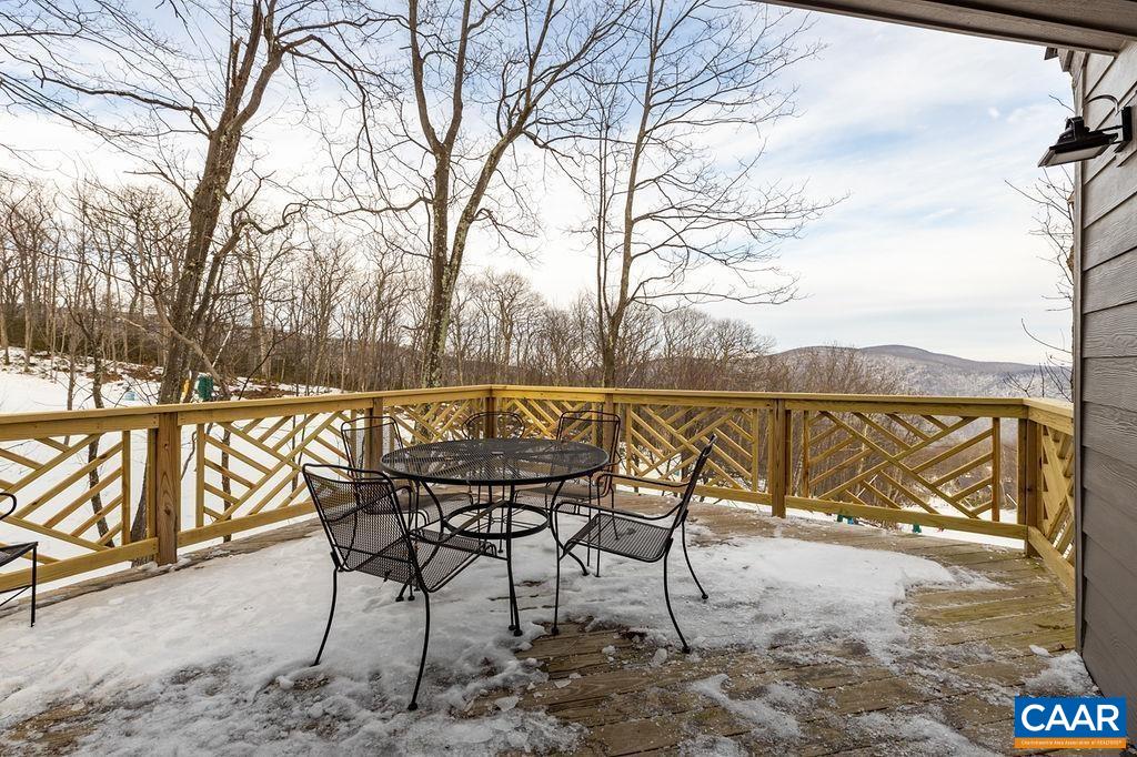 134 Squirrel Tree Lane Roseland, VA 22967 - Photo 17 of 40 a view of a chairs and table on the terrace