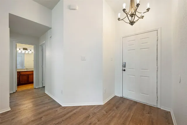 a view of a livingroom with wooden floor