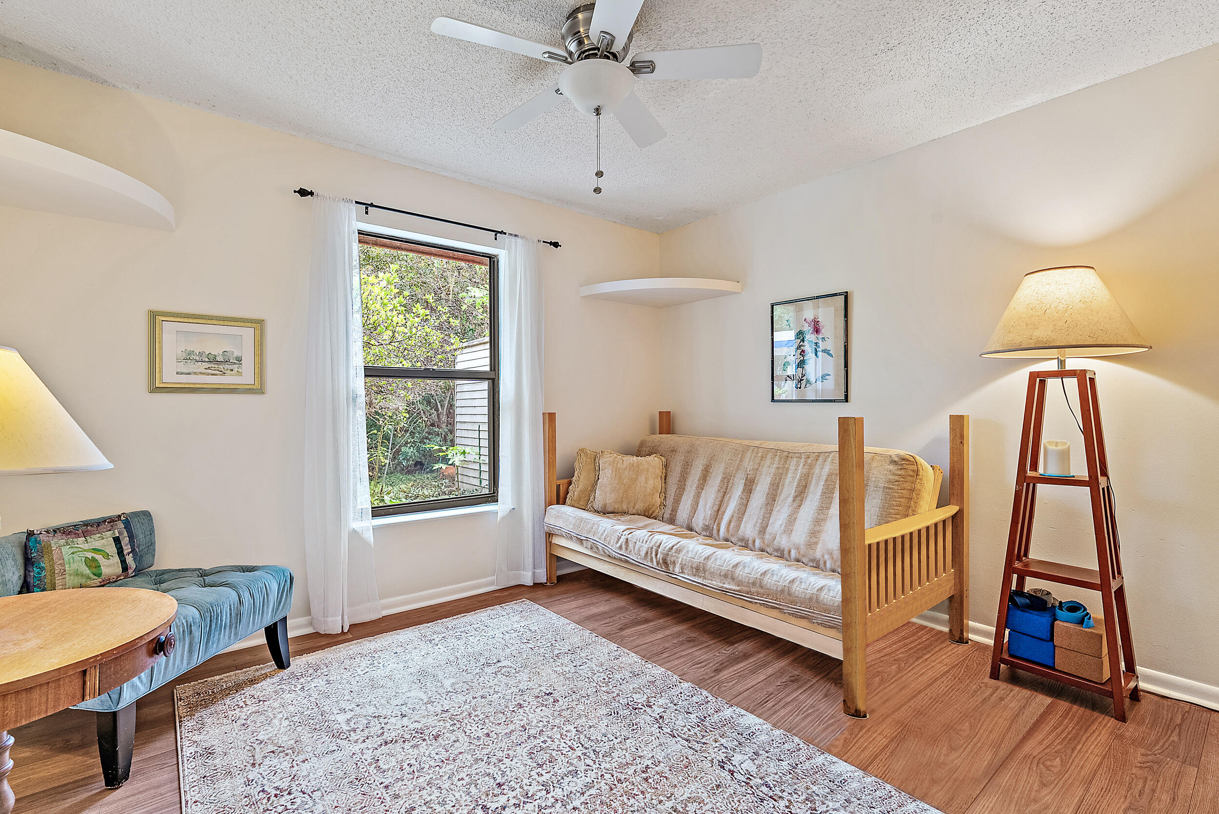 154 Chapel Lane Tequesta, FL 33469 - Photo 17 of 28 a spacious bedroom with a bed and a window