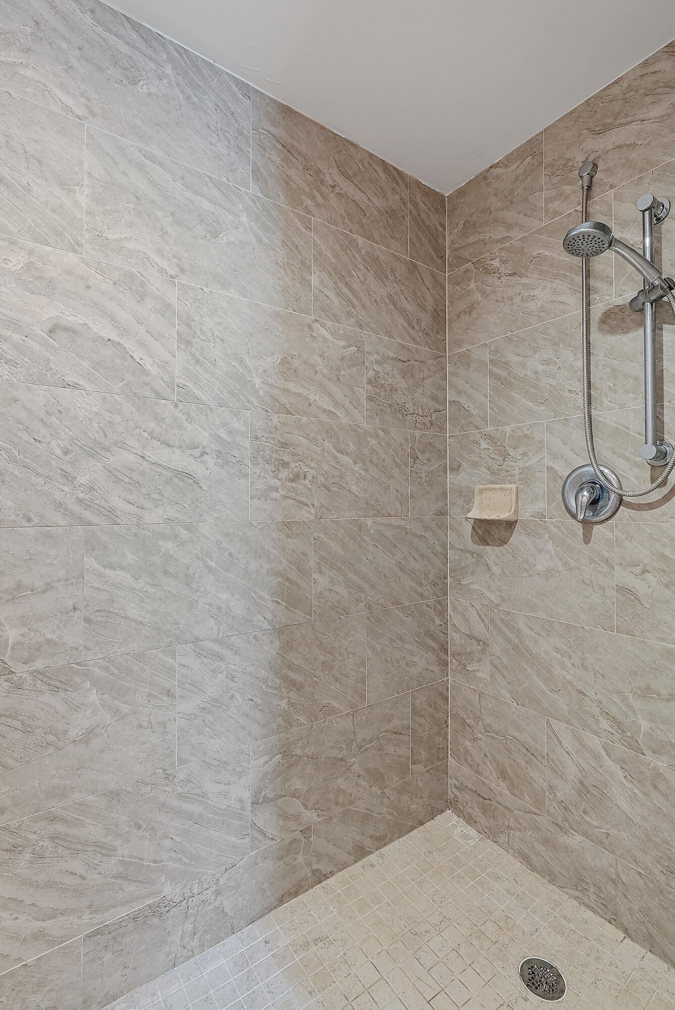 154 Chapel Lane Tequesta, FL 33469 - Photo 19 of 28 a bathroom with a shower