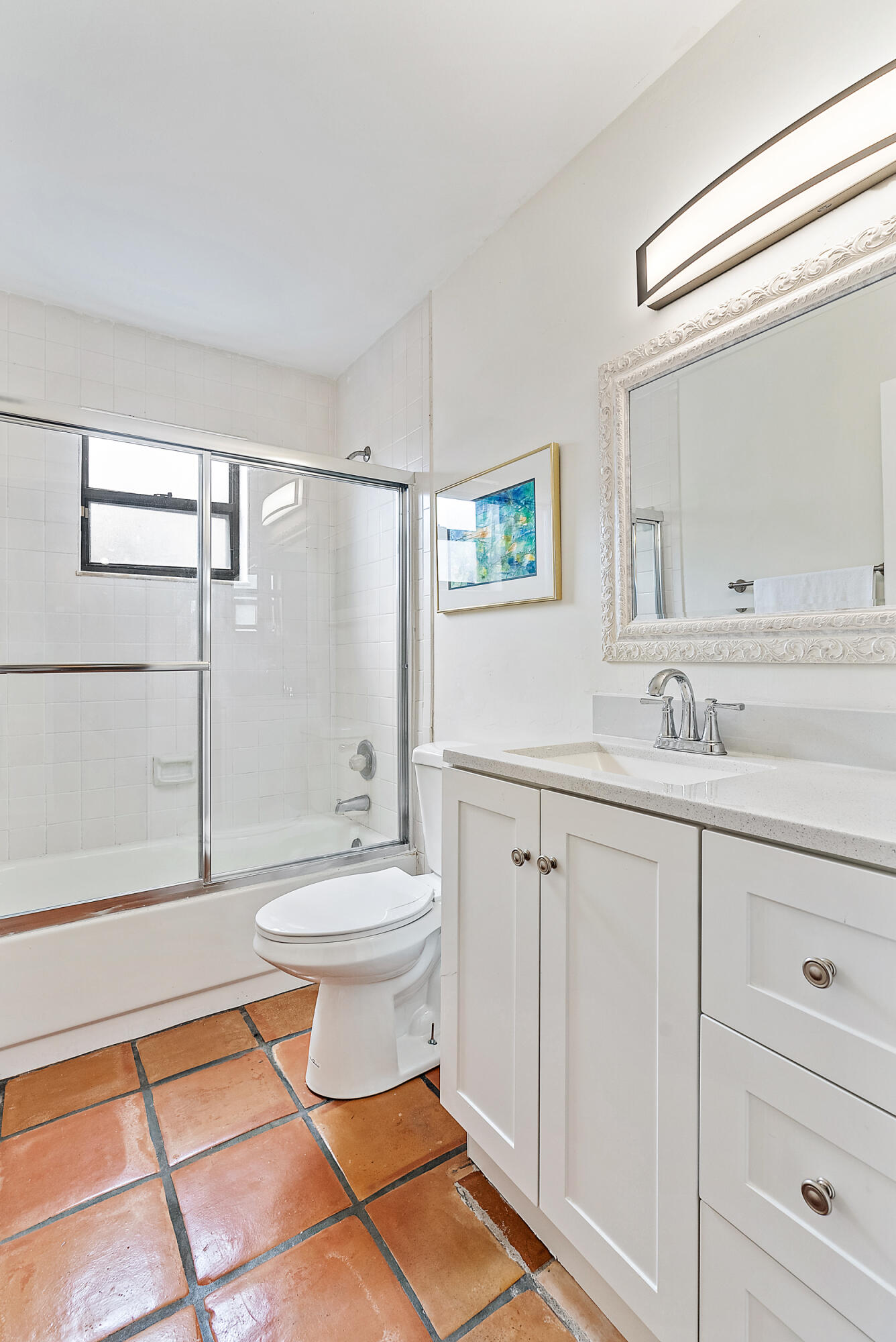 154 Chapel Lane Tequesta, FL 33469 - Photo 20 of 28 a bathroom with a sink a toilet and shower