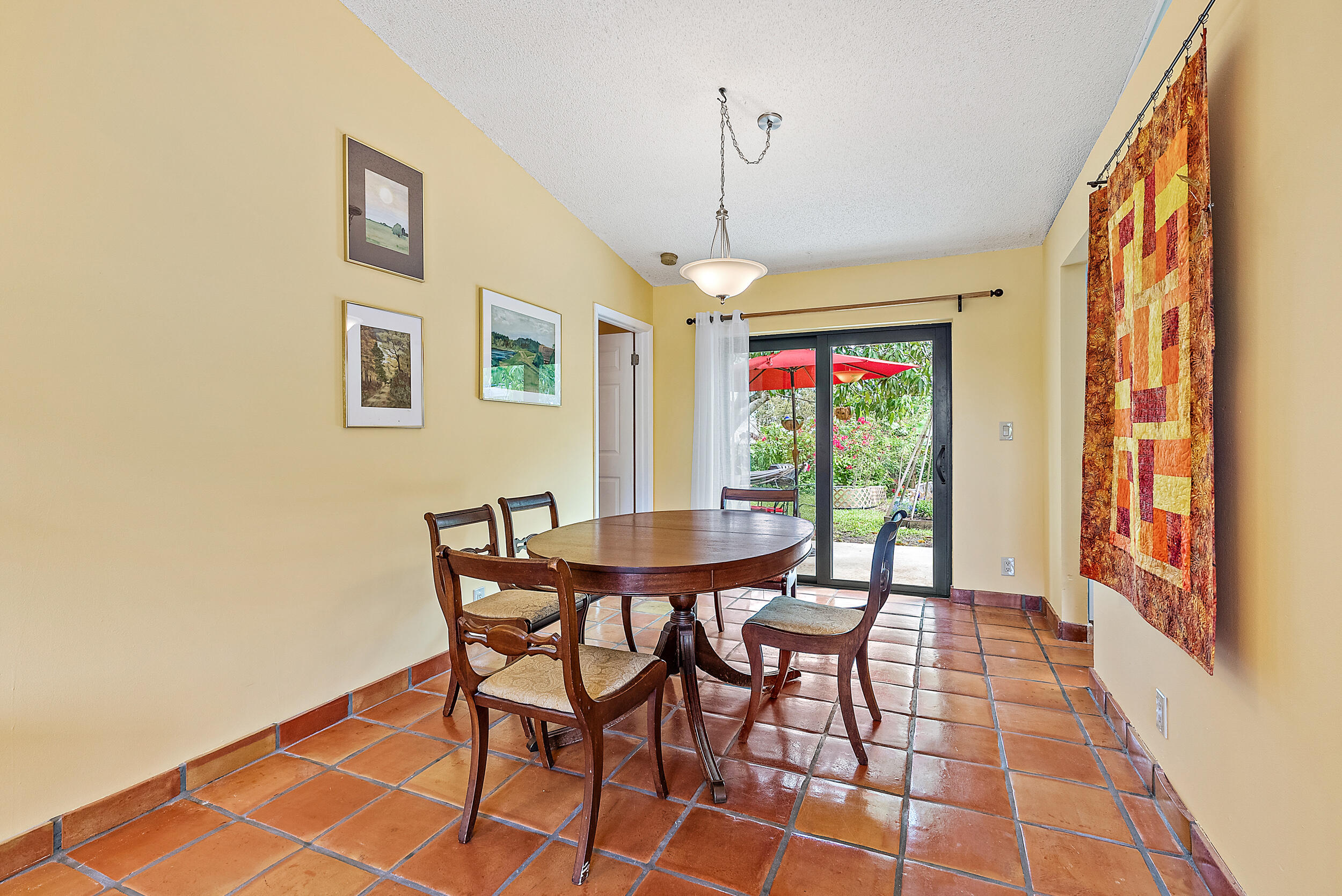 154 Chapel Lane Tequesta, FL 33469 - Photo 7 of 28 a dining room with furniture and window