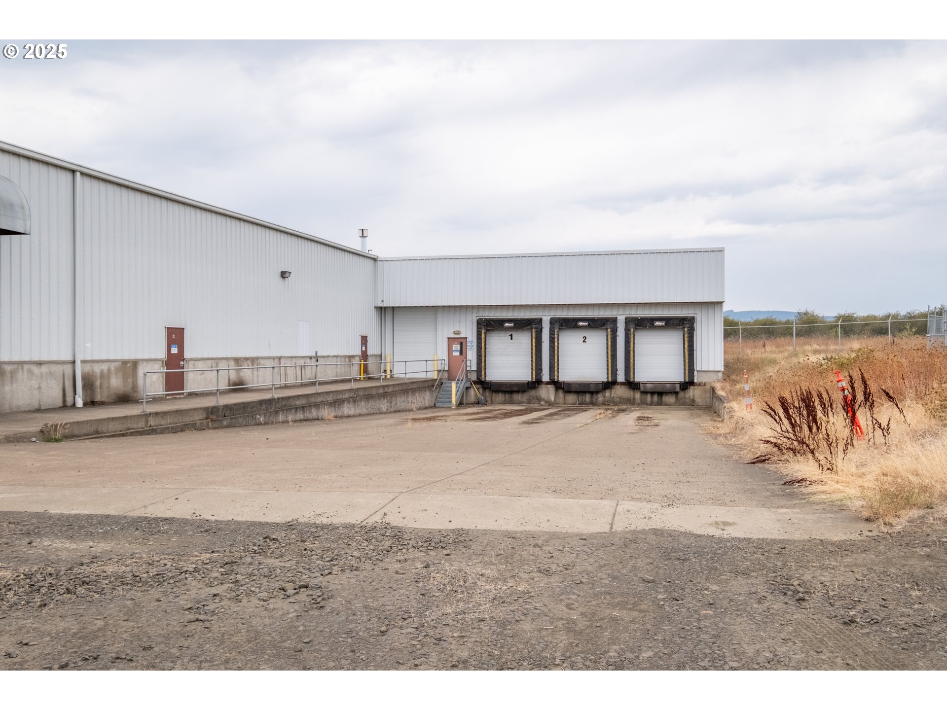 595 North Fir Villa Road Dallas, OR 97338 - Photo 27 of 37 a view of a kitchen with kitchen island and a sink