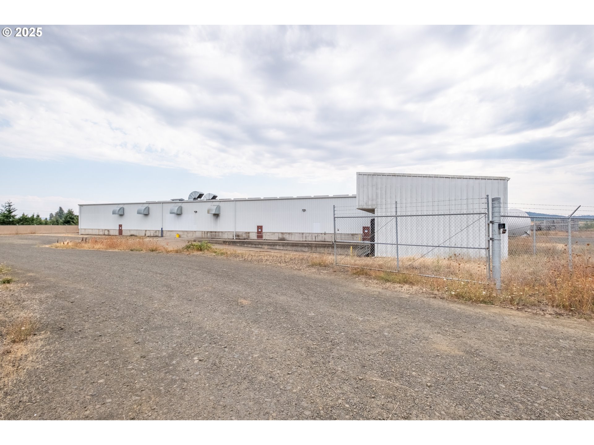 595 North Fir Villa Road Dallas, OR 97338 - Photo 28 of 37 a view of a big yard with wooden fence