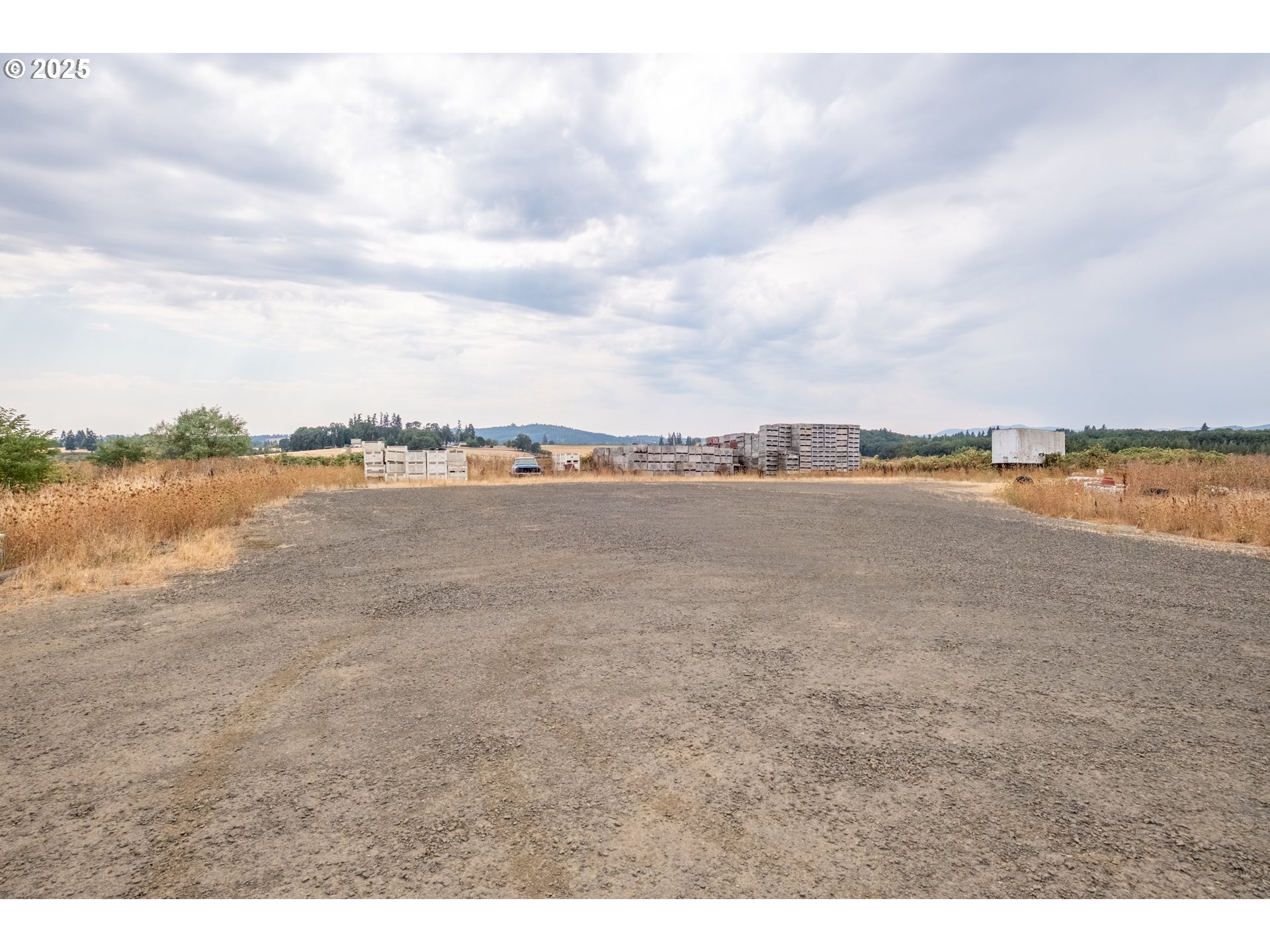 595 North Fir Villa Road Dallas, OR 97338 - Photo 32 of 37 a view of a lake with houses in the back
