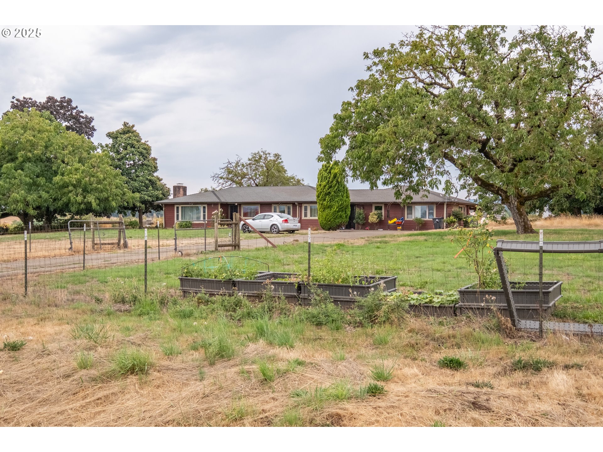 595 North Fir Villa Road Dallas, OR 97338 - Photo 35 of 37 a view of a garden with an outdoor space