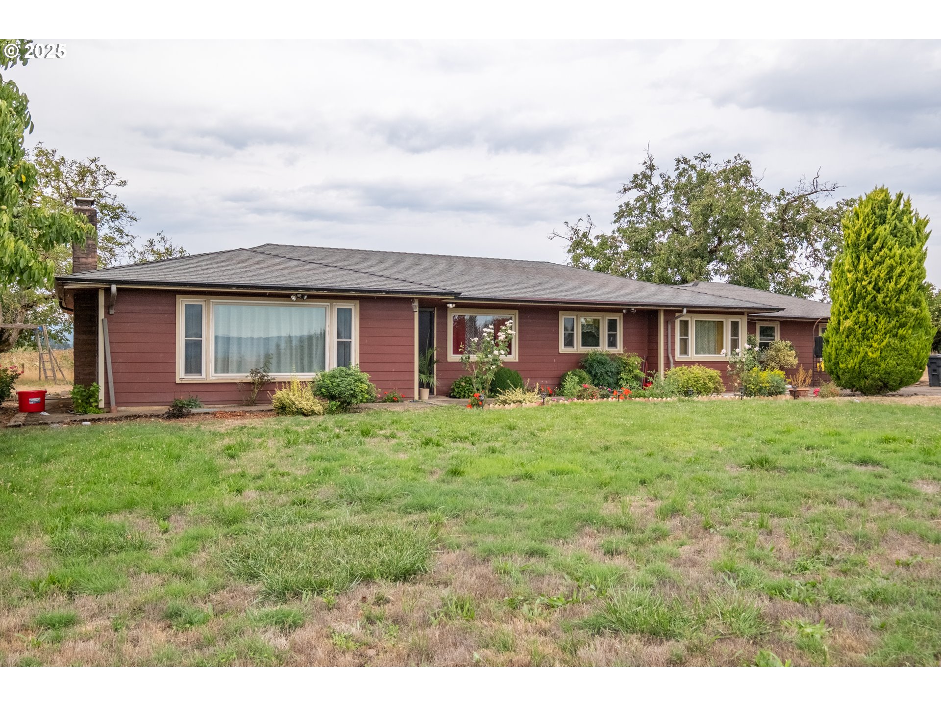 595 North Fir Villa Road Dallas, OR 97338 - Photo 37 of 37 a view of a house with backyard and garden